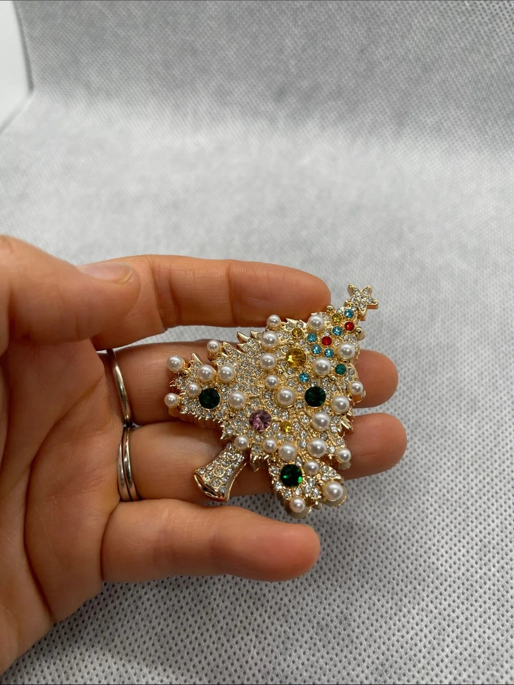 Golden tone Christmas tree brooch